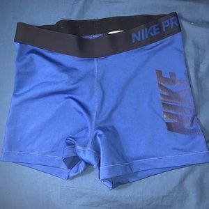 Women’s blue Nike Pro compression shorts